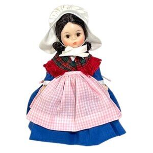 Madame Alexander restrung 8" Belgium doll with stand.